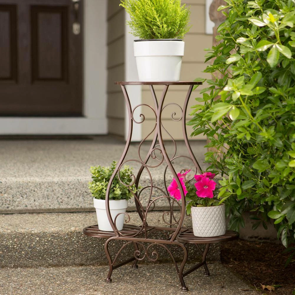 Zingz & Thingz 22.25 in. x 11.75 in. x 26.75 in. Iron Hourglass Triple Plant Stand - Image 4