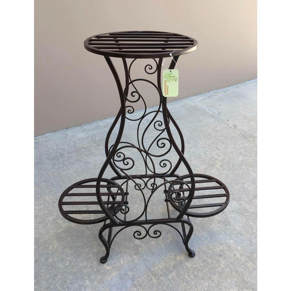 Zingz & Thingz 22.25 in. x 11.75 in. x 26.75 in. Iron Hourglass Triple Plant Stand - Image 3