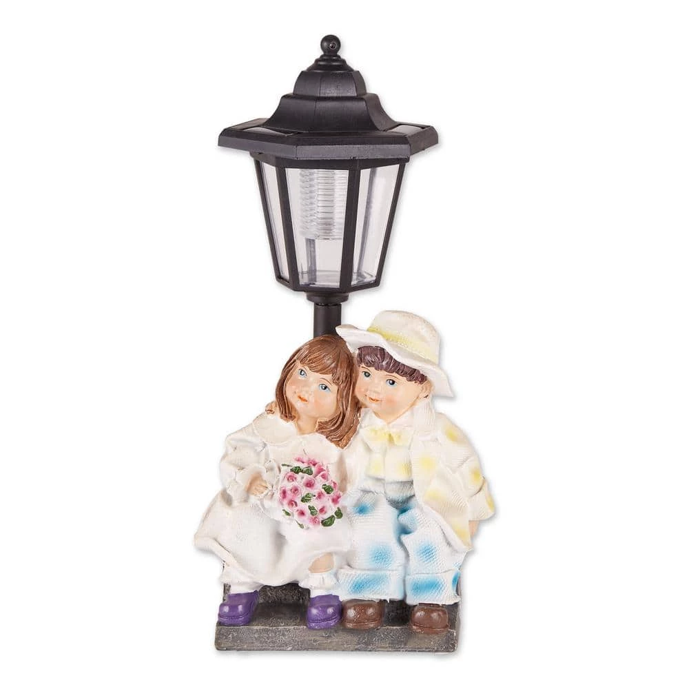 Zingz & Thingz 8 in. x 6 in. x 12.75 in. Couple with Solar Street Light Statue